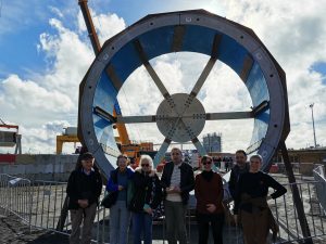 Roy, Liz Freddie, Trev, Chris, Damien and Mary - and segment ring which will form the tunnel.